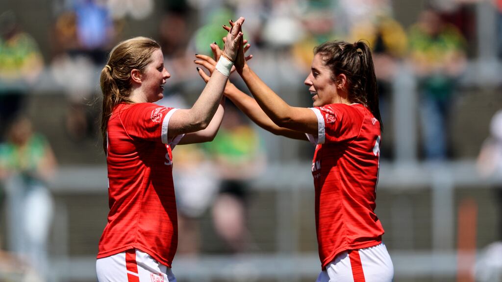Cork’s Róisín Phelan and Ciara O’Sullivan celebrate after victory over Kerry in the TG4 Munster Ladies Senior Football Championship Final in May. File photograph: Inpho