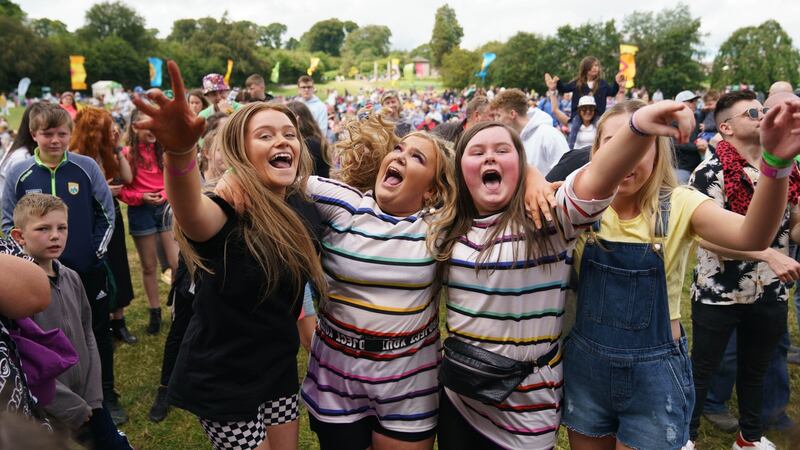 Sarah Barry (17), Chantelle Quigley (16) and Shauna O’Neill (14) enjoying Sean and Conor Price’s performance at Kaleidoscope Festival in Russborough House. Photograph: Fran Veale