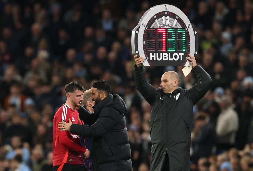 Mason Mount is consoled by Manchester United manager Ruben Amorim as he leaves the pitch during the Premier League game against Manchester City at Etihad Stadium. Photograph: Carl Recine/Getty Images