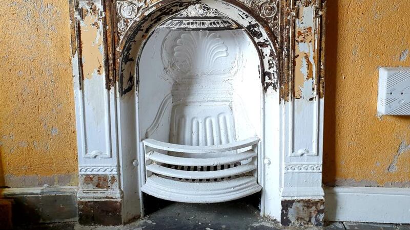 An original fireplace in the home of Jude Sherry and Frank O’Connor.