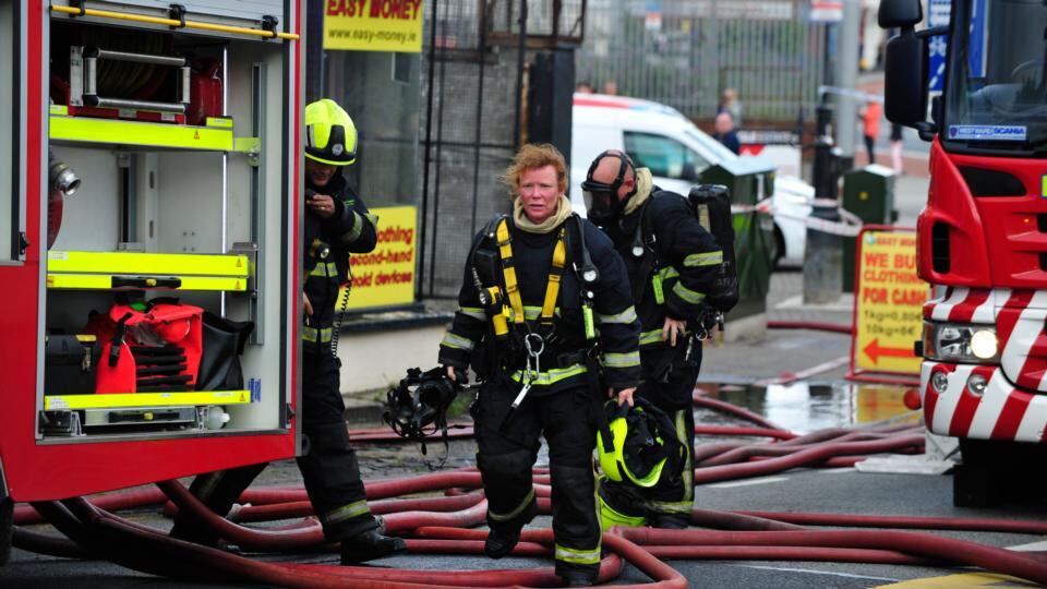 Firefighters wreathed in smoke in Bray this evening. Photograph: Aidan Crawley/The Irish Times