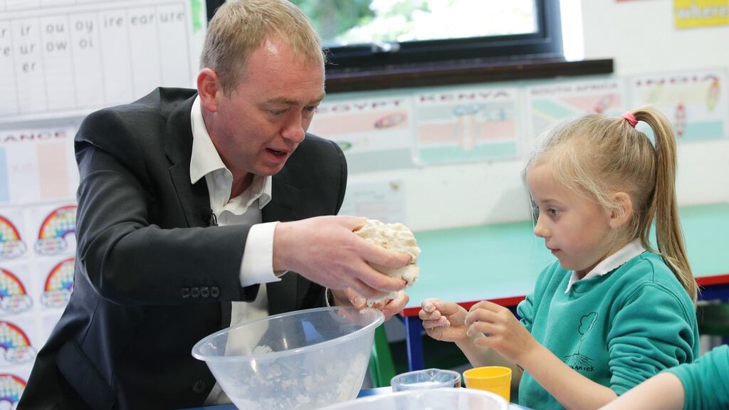 Liberal Democrats leader Tim Farron joins pupils for a cookery class at Lewannick Primary School in Cornwall on Wednesday, where he was campaigning in the general election. He accused the Conservatives of driving “a battle bus and horses” through the spirit of the electoral law. Photograph: Yui Mok/PA Wire