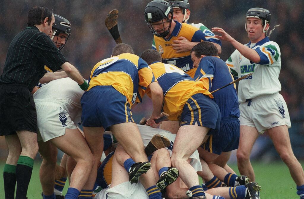 Referee Willie Barrett tries to stop a fight during the Clare v Waterford 1998 Munster final. Photograph: James Meehan/Inpho