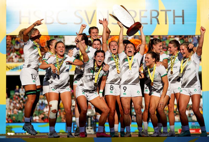The Ireland team celebrate with the trophy in Perth. Photograph: Travis Hayto/Inpho