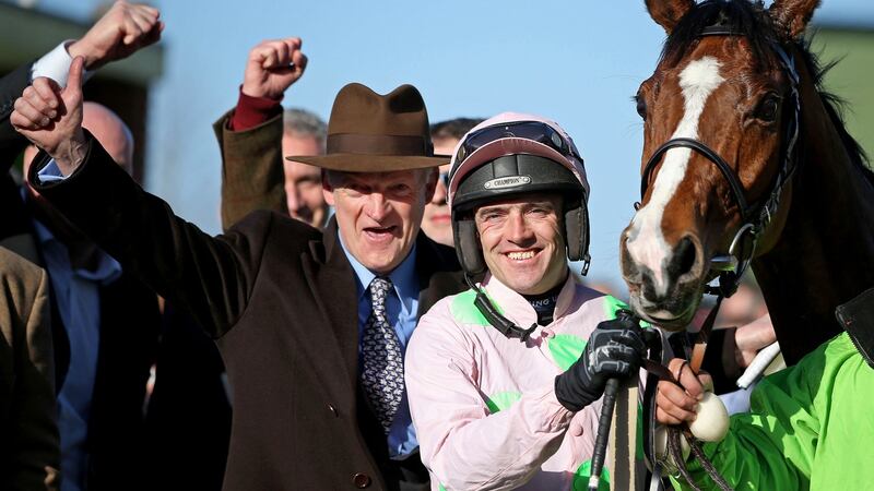 Trainer Willie Mullins and jockey Ruby Walsh celebrate after Faugheen’s victory in the Champion Hurdle at the 2015 Cheltenham Festival. Photograph: Dan Sheridan/Inpho