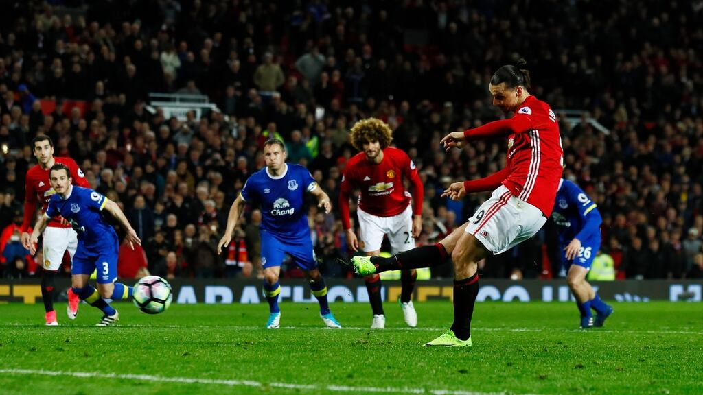 Manchester United’s Zlatan Ibrahimovic scores from the penalty spot at Old Trafford. Photograph: Reuters