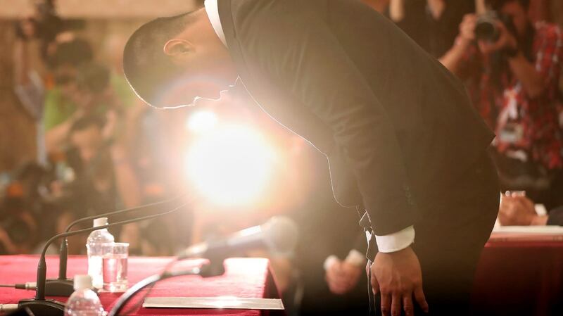 Japanese university American footballer Taisuke Miyagawa bows to apologise during a press conference in Tokyo on Tuesday. Photograph: Jiji Press/AFP/Getty Images