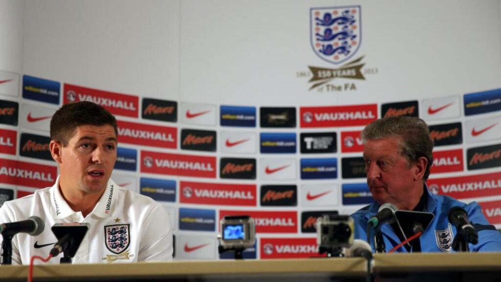 England captain Steven Gerrard and manager Roy Hodgson (right) address a press conference   at the Grove Hotel, London. Photograph: Nick Potts/PA Wire