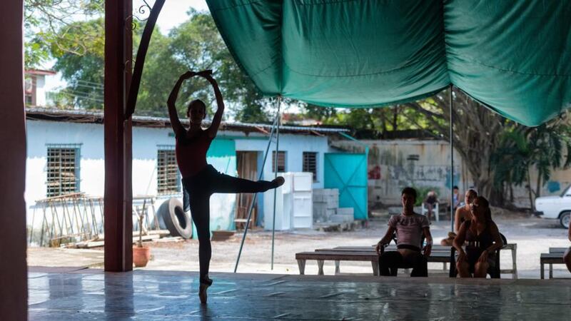 “I like the silhouettes best, the shapes are quite graphic. In some ways, when you can’t see the facial expressions the shadows accentuate the dancers’ form.” Prodanza Ballet School, Habana, Cuba. Photograph: Michael Mac Sweeney