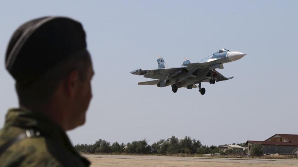 A Russian SU-33 naval fighter plane during a drill west of the Crimean city of Simferopol. US intelligence expects fighter jets to form part of the next phase of the buildup at the airbase in Syria. Photograph: Pavel Rebrov/Reuters