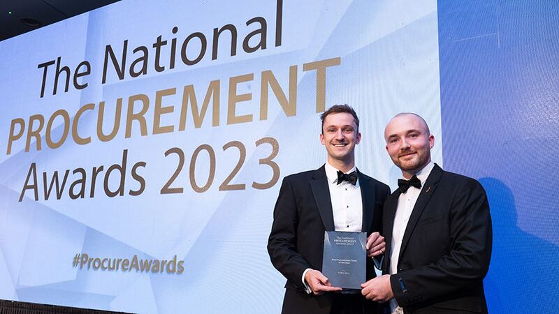 Thomas Hickey, community lead at BusinessRiver, presents the best procurement team of the year award to Morgan Rose, PTSB & Efficio