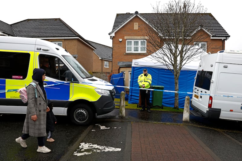 Detectives mounted searches of the Glasgow home owned by Peter Murrell and Nicola Sturgeon and the party’s headquarters in Edinburgh. The police erected a large tent over the front door of their semi-detached home, where the curtains remained drawn, and searched their garden, with the pavement outside cordoned off by police. Photograph: Jeff J Mitchell/Getty Images