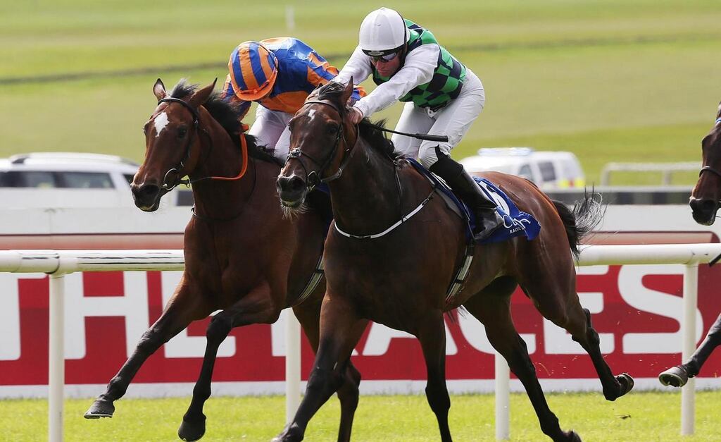 Seamie Heffernan on Diamondsandrubies (white hat) wins the Pretty Polly Stakes from Legatissimo and Ryan Moore at the Curragh. Photograph: Lorraine O’Sullivan/Inpho