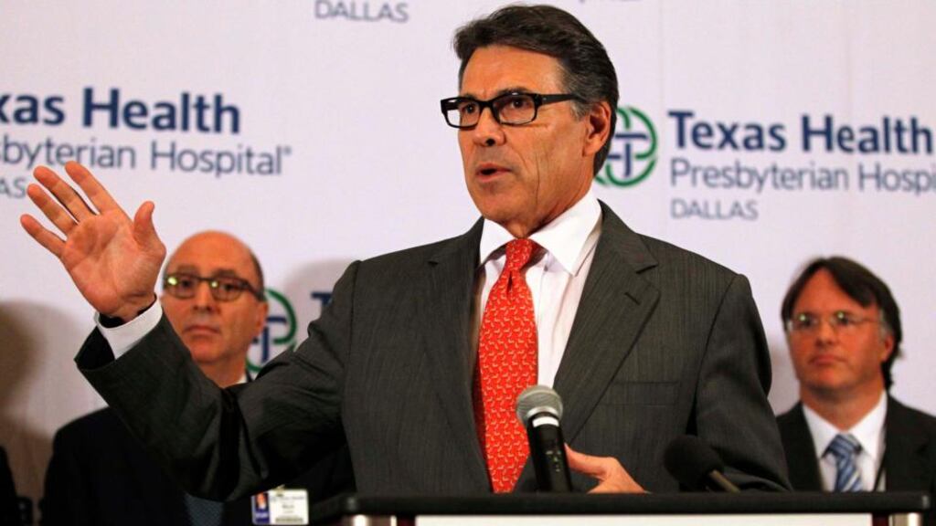 Texas Governor Rick Perry at a media conference at Texas Health Presbyterian Hospital in Dallas yesterday. Photograph: Reuters/Mike Stone