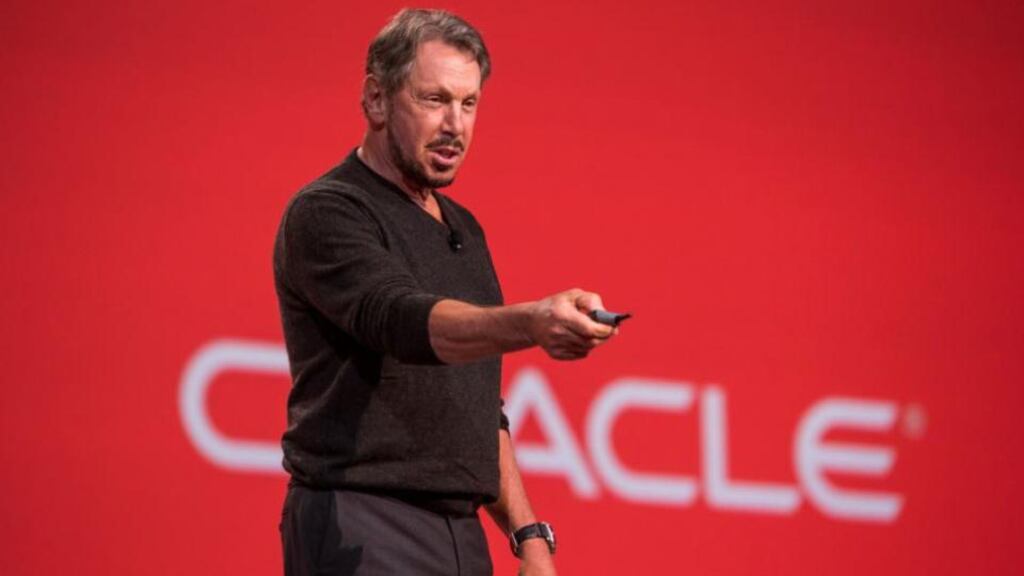 Oracle chief Larry Ellison addresses the Oracle OpenWorld conference in San Francisco on Sunday. He said security “is going to become a bigger and bigger risk as we move vast amounts of data into the cloud.” Photographer: David Paul Morris/Bloomberg.