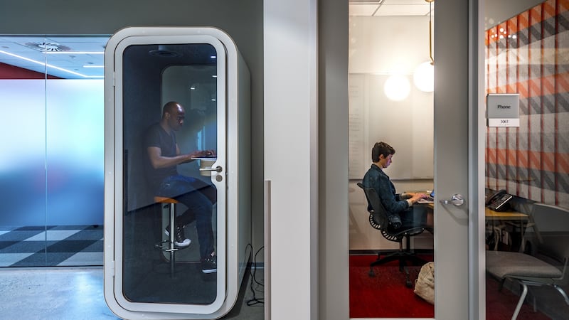 A phone-booth-style room for privacy, left, and an isolation room, right, on Microsoft’s campus in Redmond, Washington.  Photograph: Stuart Isett/The New York Times
