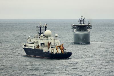 The Royal Navy vessel RFA Proteus, right, patrols near the Yantar, a Russian ship suspected of monitoring British undersea connectors last November. Photograph: Ministry of Defence