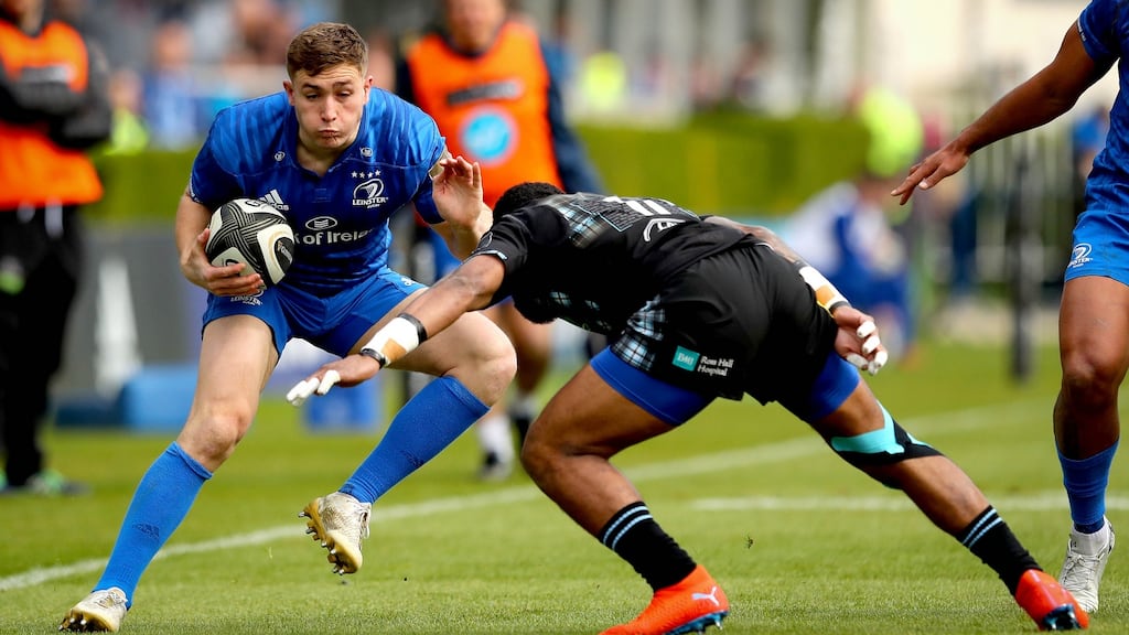 Leinster’s Jordan Larmour tries to avoid the tackle of Niko Matawalu of Glasgow Warriors during the Guinness Pro 14 game at the RDS. Photograph: Ryan Byrne/Inpho