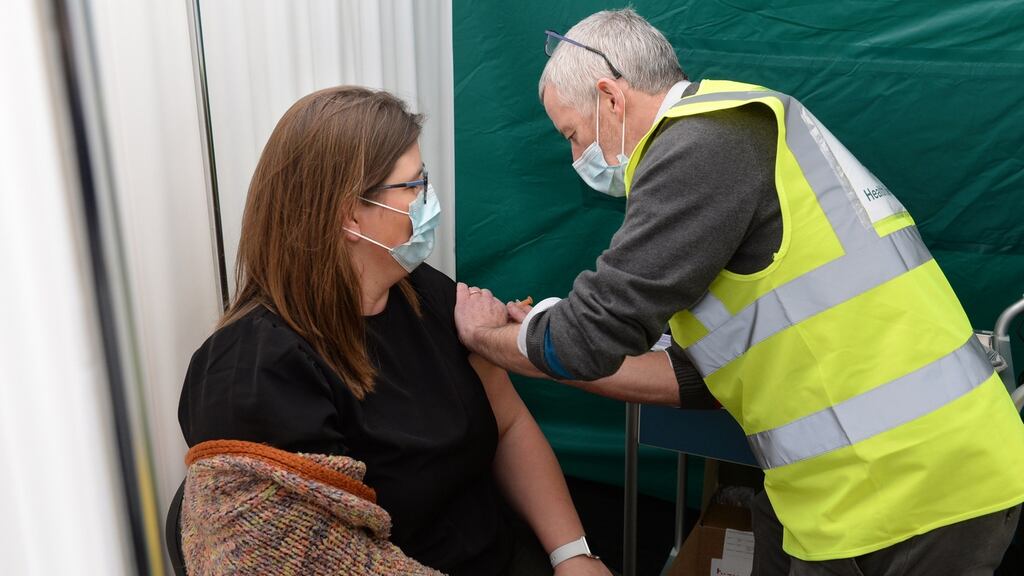 Dr Philip Crowley of the HSE administers the Moderna vaccine to Dr Dagmar Howey-Meeuse, as GPs and practice nurses receive their second dose of the vaccine at St Mary’s Hospital in Dublin on Saturday. Photograph: Dara Mac Dónaill/The Irish Times