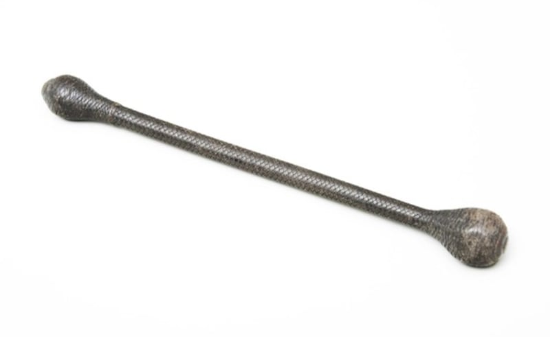 A life preserver or cosh, a woven reinforced rope with lead weights. Leeds Museums' accession register states: "Taken by a police superintendent form an Irish rioter."