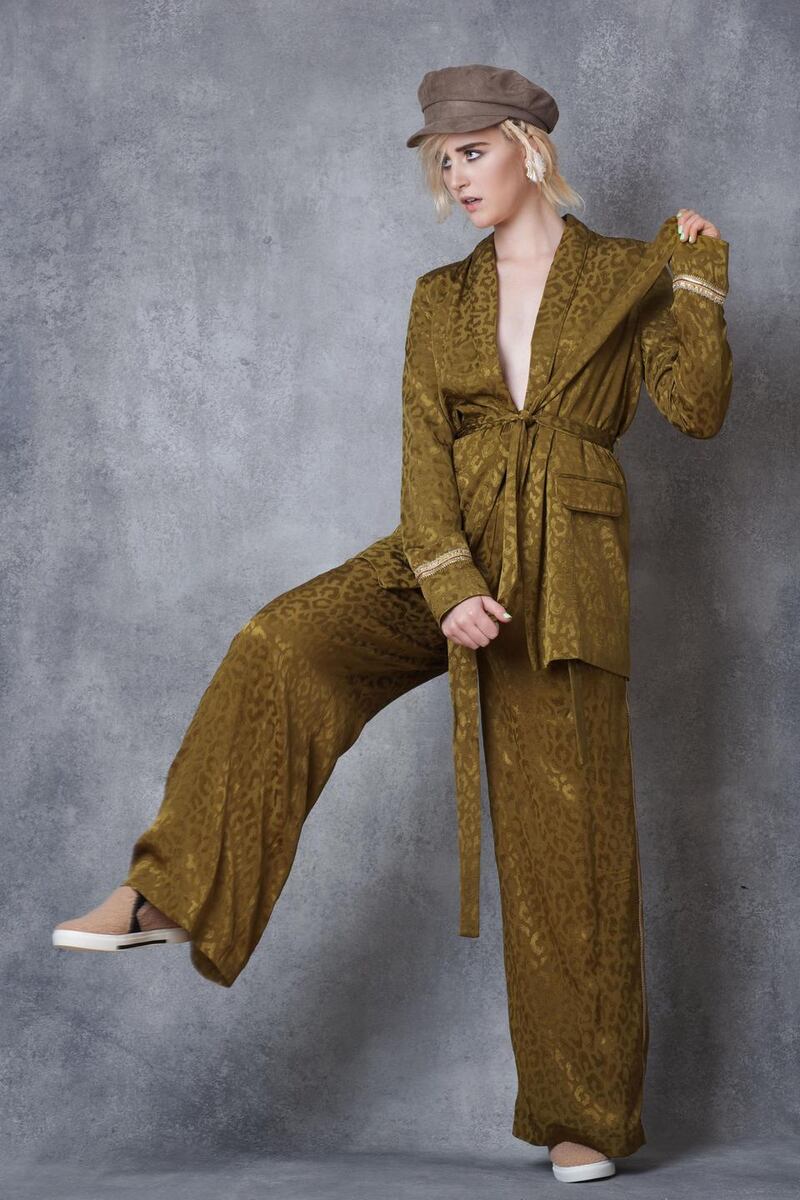 Jacket €107, trousers €107, runners €34, all River Island; hat €19.99 H&M; earrings €199 Loulerie.