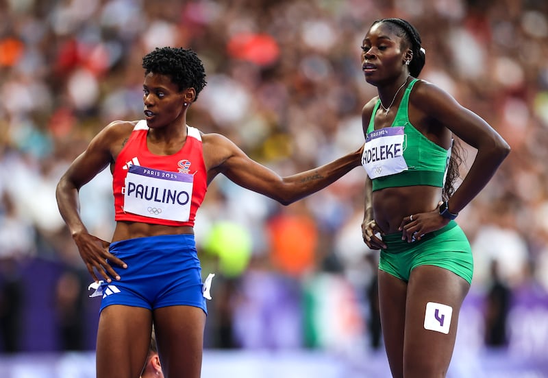 Ireland’s Rhasidat Adeleke with 400m champion Marileidy Paulino of the Dominican Republic after the race in the Stade de France. Photograph: Morgan Treacy/Inpho