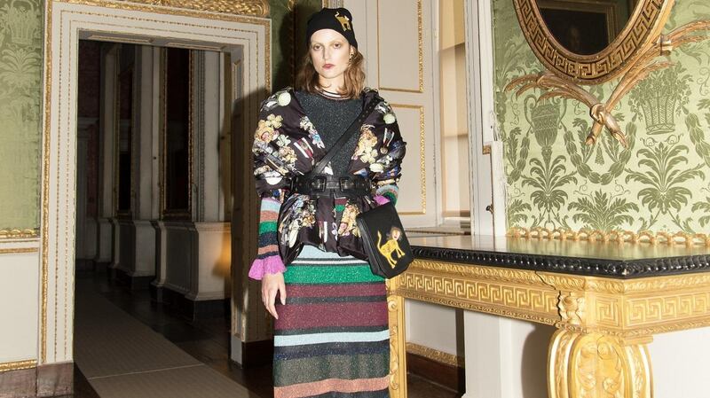 Cashmere mix Tiger Lily hat €30, Rhinestones Dublin padded shawl jacket €220, striped lurex knit dress €150, black leather Constance Markievicz harness €350, rose-printed velvet leggings €75, velvet shoes €140