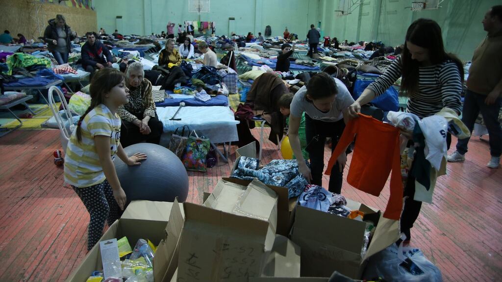 Ukrainian evacuees take shelter at a former sports hall in Taganrog in the Rostov region, Russia. Photograph:  Fedor Larin/Anadolu Agency via Getty Images
