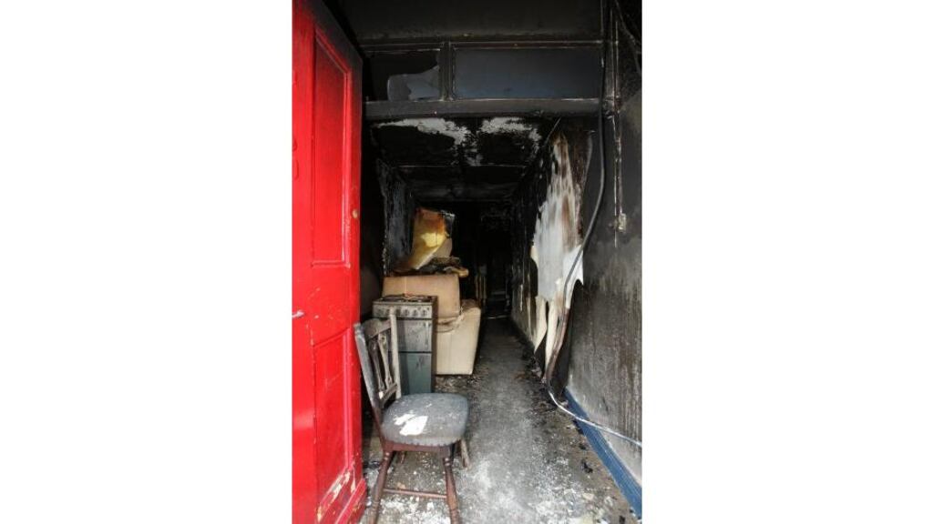 The opened front door of the apartment building which went on
fire in O'Connell Street, Waterford, yesterday.