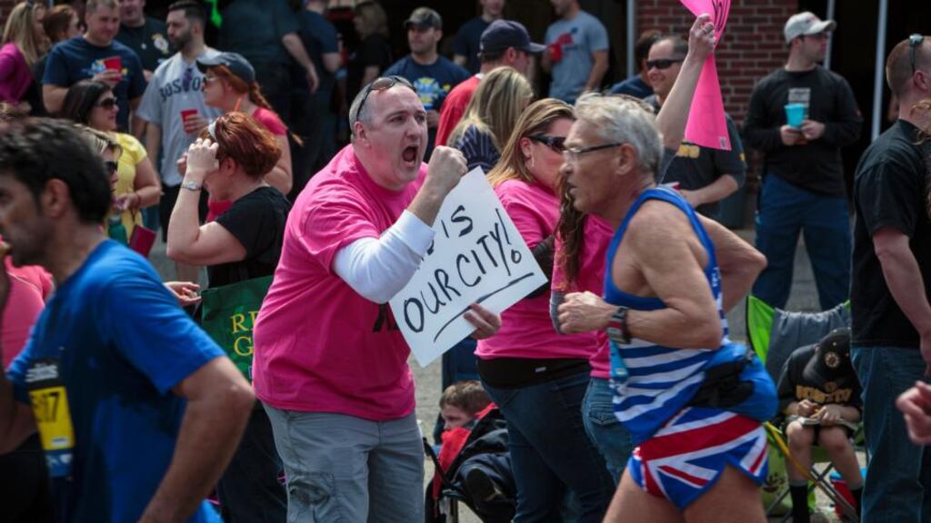 Runners are offered encouragement at Heartbreak Hill as they compete in the Boston Marathon in Newton, Massachussetts, yesterday. Photograph: Evan McGlinn/The New York Times