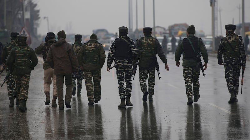Indian paramilitary soldiers patrol near Pampore after a car bomb attack. Photograph: AP Photo/Dar Yasin