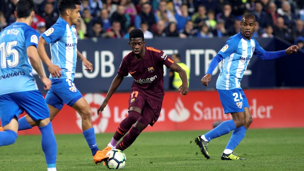 Barcelona’s Ousmane Dembele in action against Malaga during the La Liga game at La Rosaleda Stadium in Malaga on Saturday night. Photograph: Daniel Perez/EPA