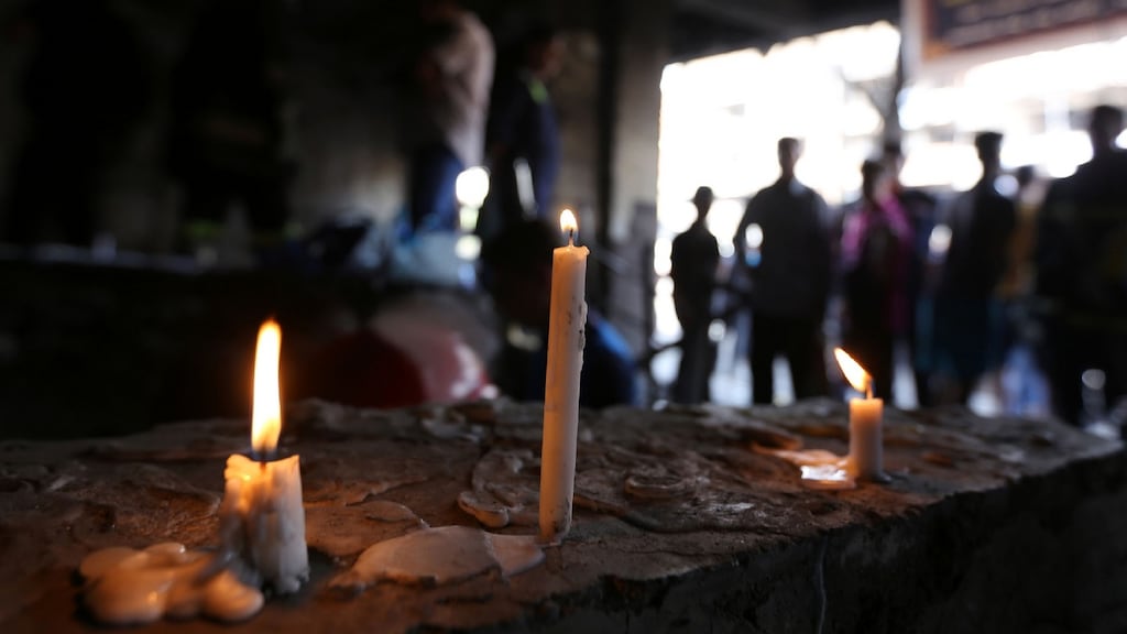 Candles at the site of a suicide-bombing attack which took place two days earlier in Baghdad’s Karrada neighbourhood. Photograph: Sabah Arar/AFP/Getty Images