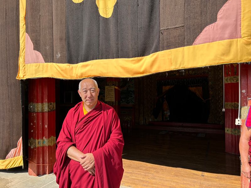 Tibetan monk Qiang Ba Ta La outside Sangpiling monastery. Photograph: Denis Staunton