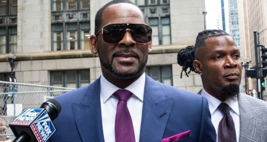 If convicted, R Kelly (centre), who also faces federal charges of pornography and obstruction in Chicago, could face up to 20 years in prison. File Photograph: Ashlee Rezin/Chicago Sun-Times via AP