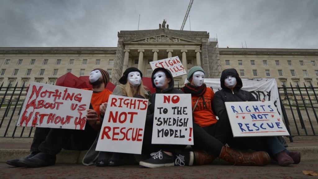 ‘Independent research by Northern Ireland’s Department of Justice showed that no locally-based sex workers surveyed supported criminalising the purchase of sex.’ Above, sex workers wearing masks to protect their identity protested against the human trafficking Bill at Stormont last week. Photograph: Charles McQuillan/Getty Images