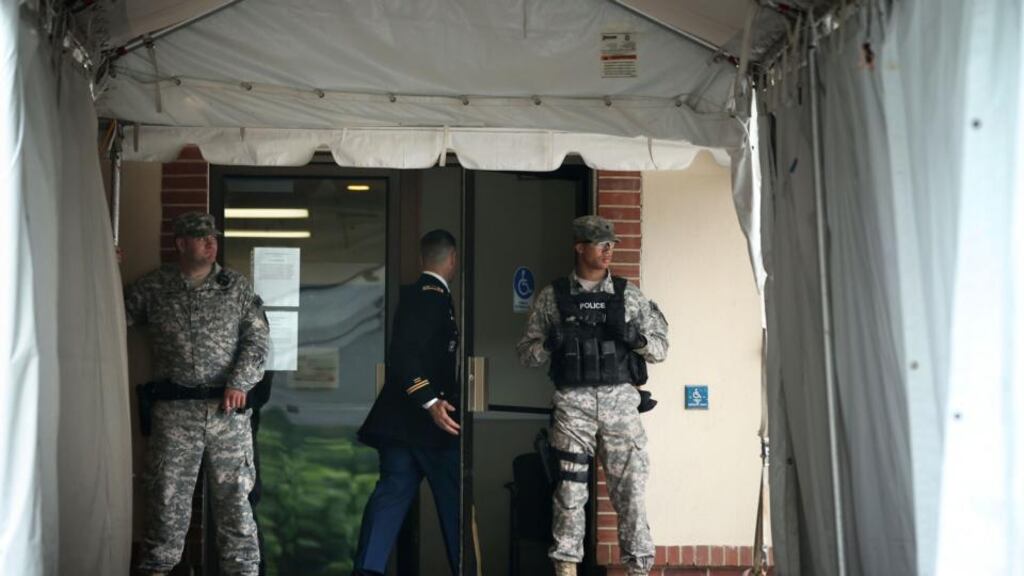 Military police stand guard at the entrance of a military court during the court-martial of US Army Private Bradley Manning at Fort Meade in Maryland. Photograph: Alex Wong/Getty Images