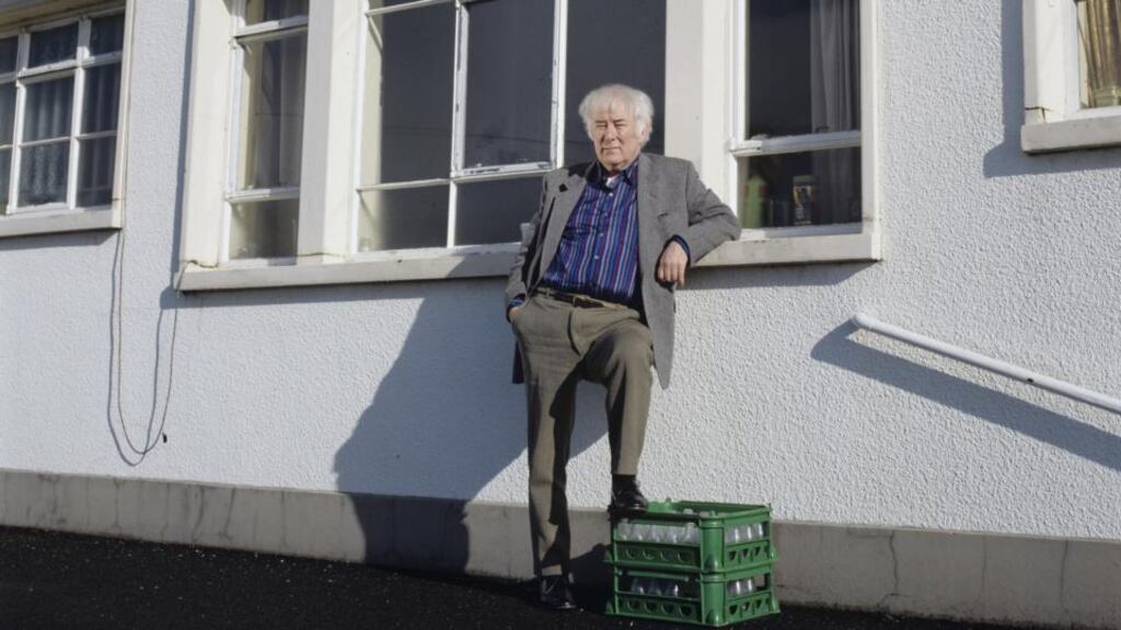 Bellaghy boy: Seamus Heaney at his old primary school, in Co Derry, in 1996. Photograph: Bobbie Hanvey, courtesy of John J Burns Library/Boston College
