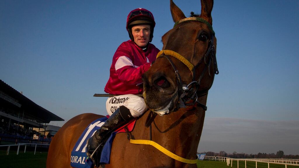 Sean Flanagan celebrates his win on Ice Cold Soul in the Coral.ie Hurdle at Leopardstown. Photograph: Patrick McCann
