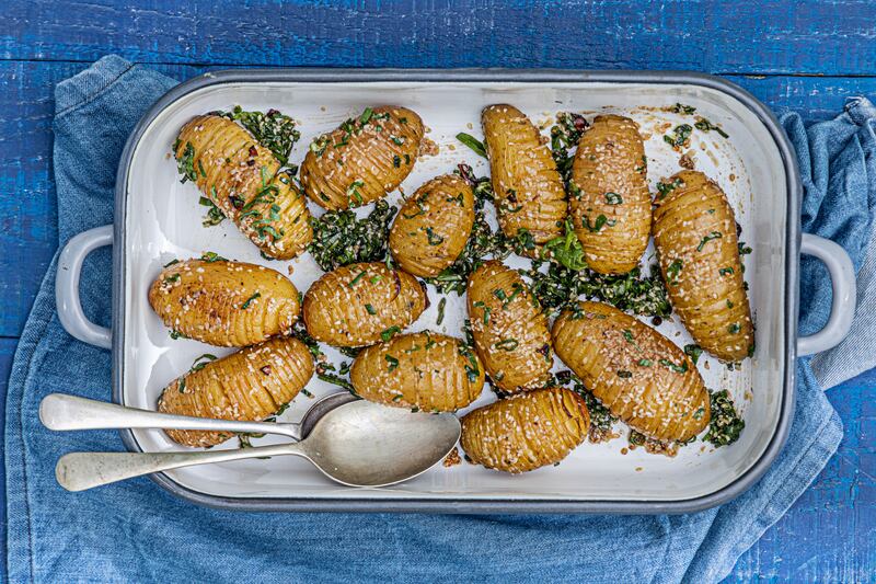 Sesame and spring onion Hasselback potatoes. Photograph: Harry Weir