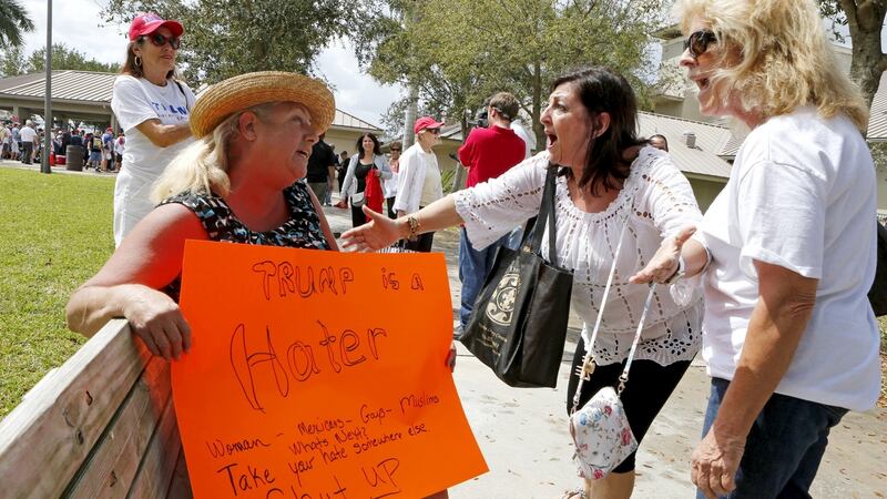 Anti-Trump protester Susan Wantz of Boca Raton, Florida,  argues with Patricia Lobracco, a supporter of the Republican presidential candidate,   before Trump’s campaign rally at the Sunset Cove Amphitheater in Boca Raton on Sunday. Photograh: Joe Skipper/Reuters