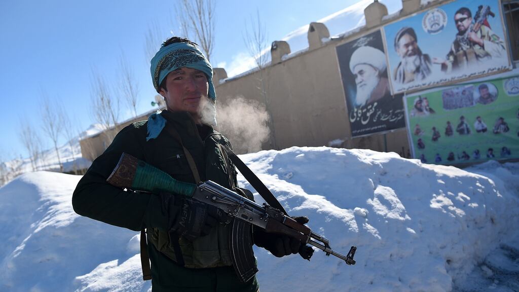 A Hazara militia member  on patrol in January against Taliban insurgents in Hisa-e-Awali Behsud district of Maidan Wardak Province. Photograph: Wakil Kohsar/AFP via Getty Images
