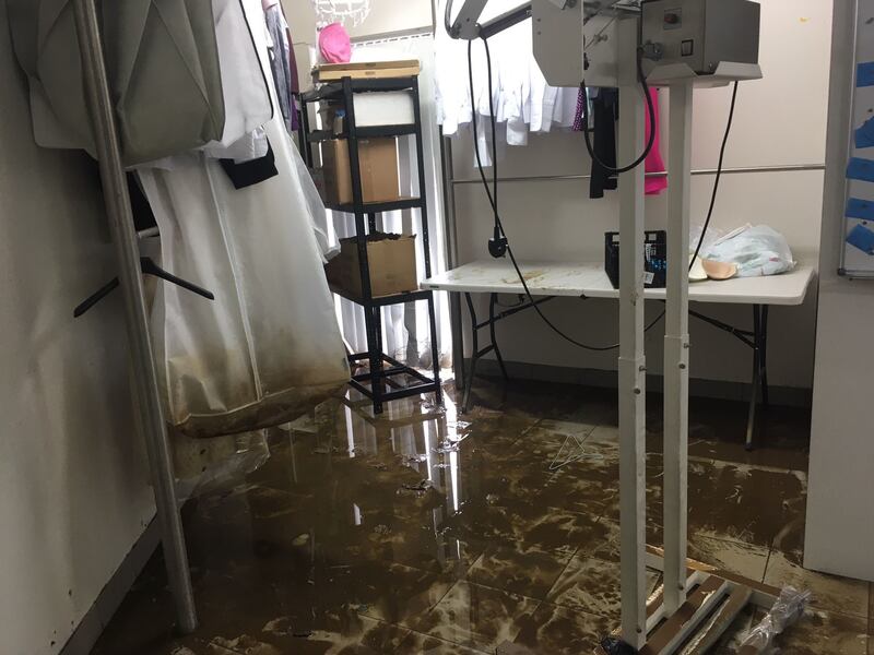 Flood damage in Ali Ghamlouch's dry cleaning shop in Derry. Photograph: Seanin Graham