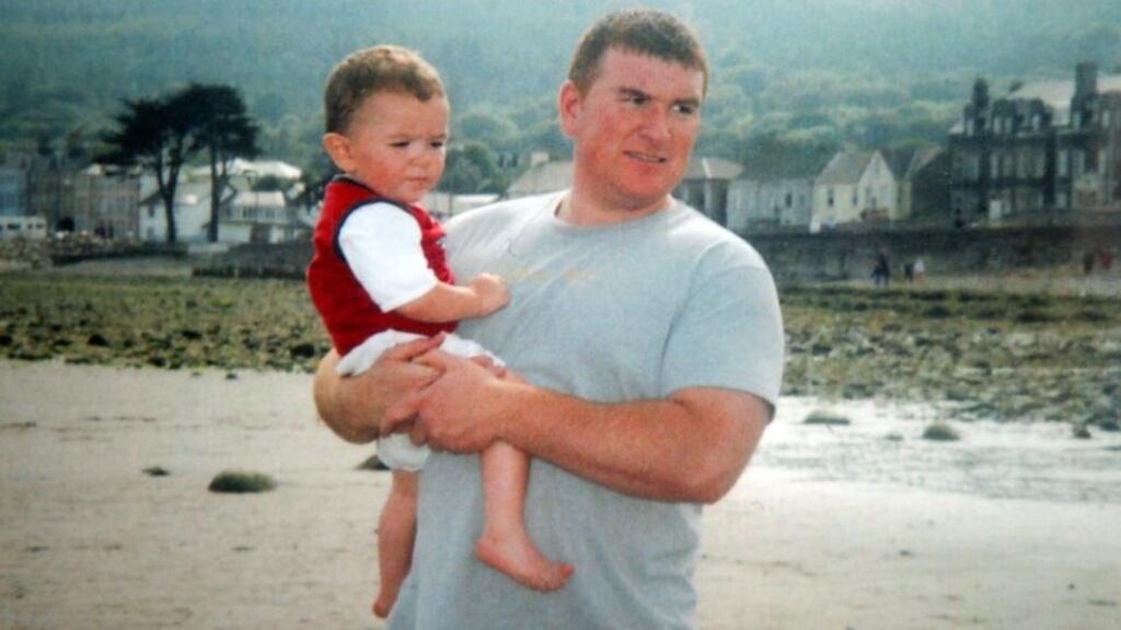 Robert McCartneywith his son Brandon on Newcastle Beach in Co Down. Mr McCartney (33) was stabbed and beaten to death outside Magennis’s bar in Belfast city centre in January 2005. Photograph: Alan Lewis/Photopress Belfast