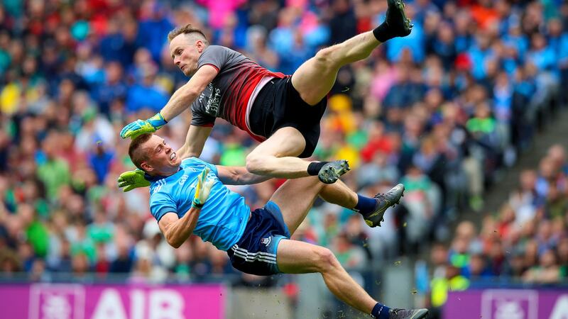 Dublin’s Con O’Callaghan collides with Rob Hennelly. Photograph: Tommy Dickson/Inpho