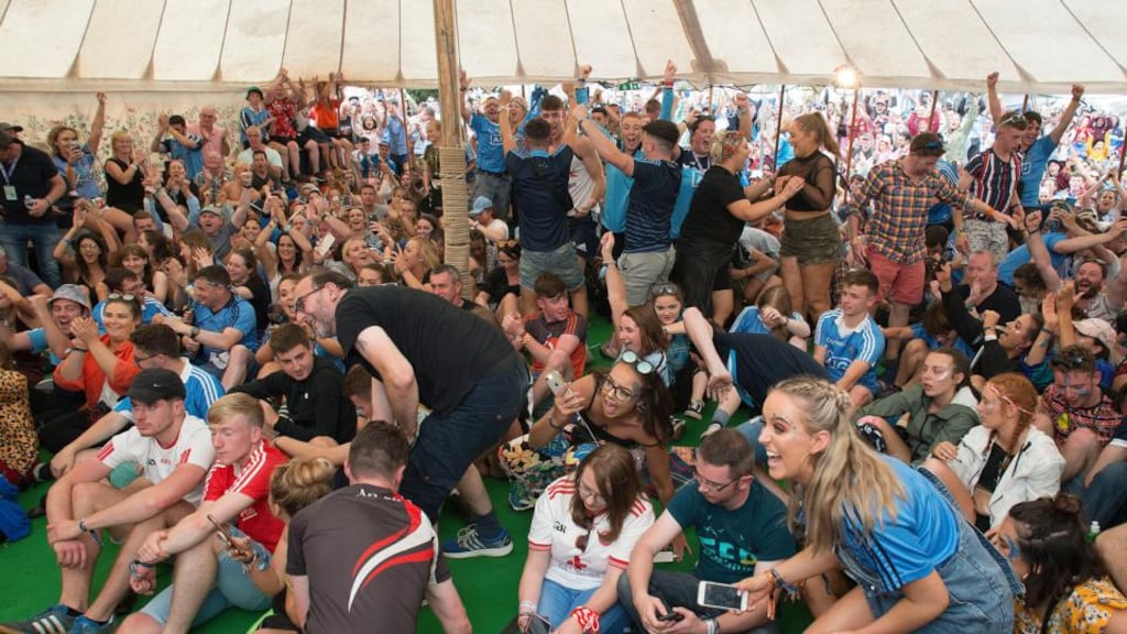 Electric atmosphere: Dublin fans at the Picnic celebrate their team’s All-Ireland win. Photograph: Dave Meehan