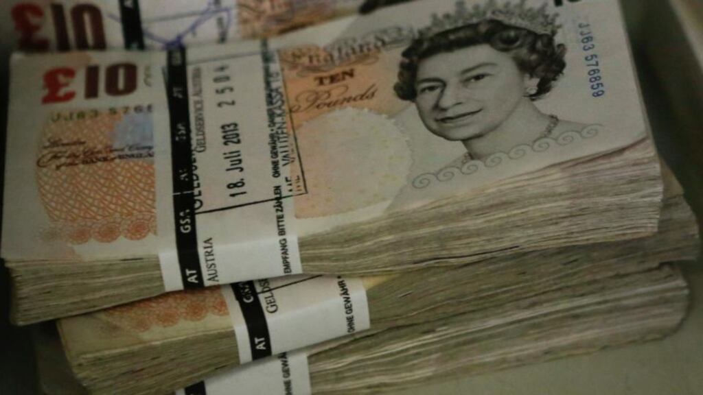 Four people have been arrested in Northern Ireland as part of a major crackdown on money-laundering and insurance fraud. Photograph: Leonhard Foeger/Reuters