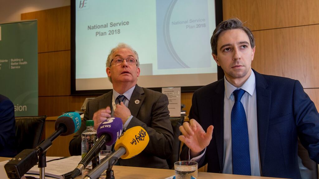 Tony O’Brien, director general of the HSE, with Minister for Health Simon Harris at the announcement of the HSE National Service Plan 2018 in December. Photograph: Brenda Fitzsimons