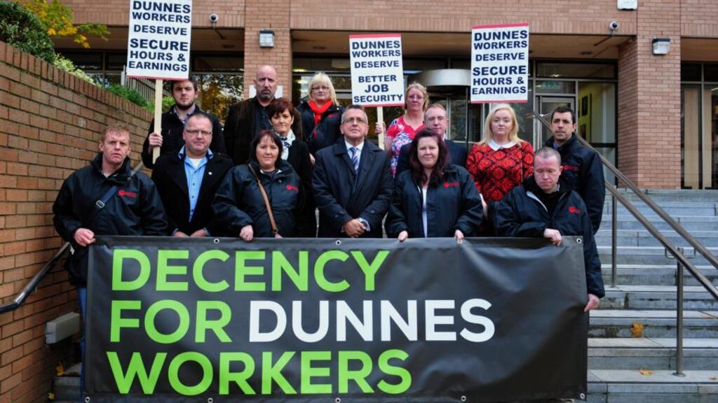Members of the Mandate trade union and Dunnes Stores workers outside the Labour Court today where they attended a hearing. They are looking for secure working hours and earmings for all workers in the company. Photograph: Aidan Crawley/The Irish Times