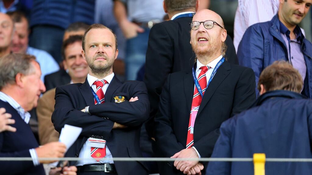 Ed Woodward, chief executive of Manchester United stands with owner Avram Glazer. Photo: Catherine Ivill - AMA/Getty Images
